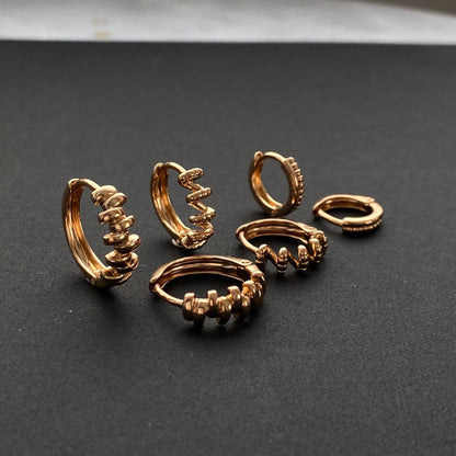 Apzeltītu auskaru komplekts ar 3 pāriem riņķīšu - 18k - apzeltita - rotas