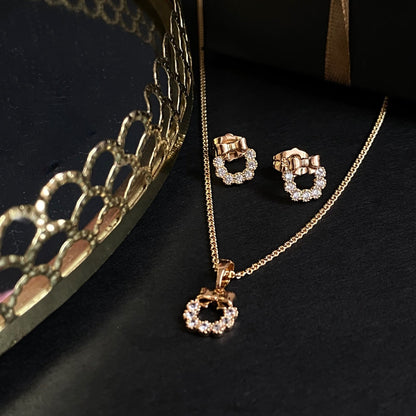 Golden Bow – Apzeltīts rotu komplekts ar kristāliem – apzeltītas rotaslietas | Tavas Rotas