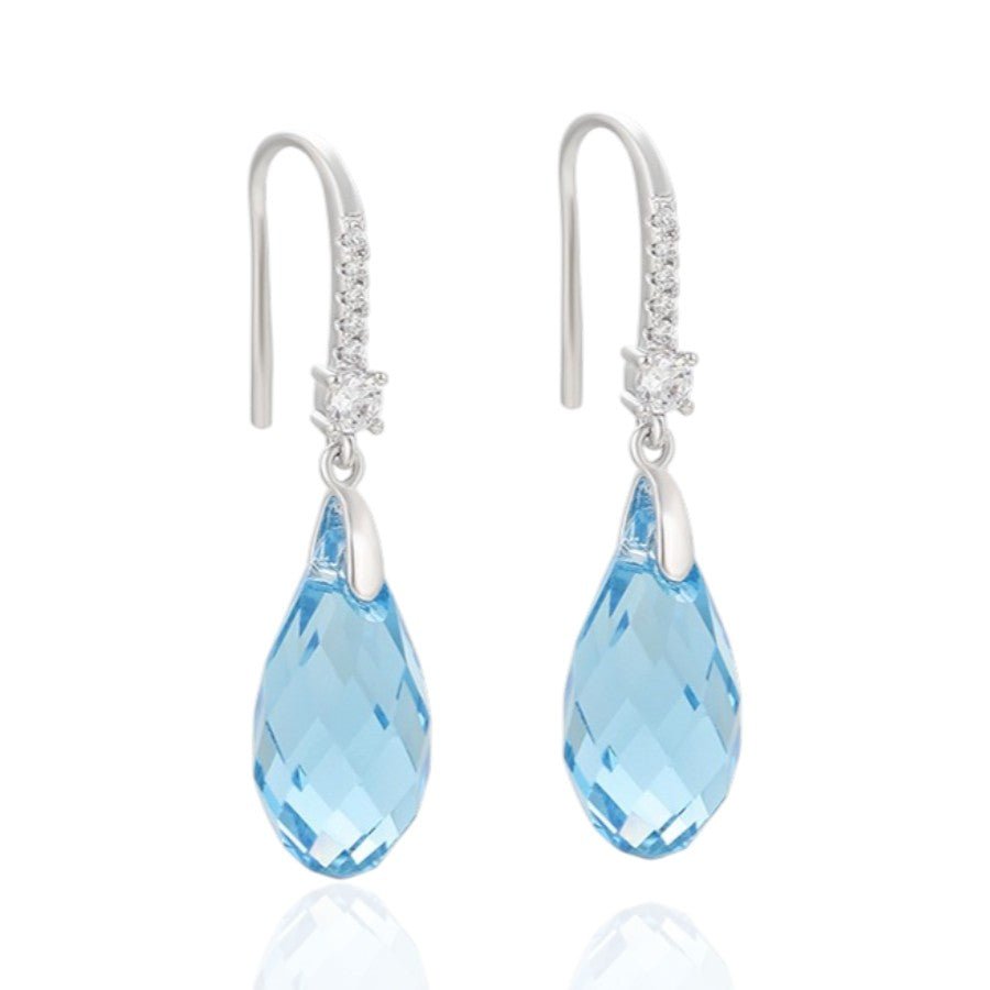 Nokareni auskari ar zilu kristālu – apzeltītas rotaslietas | Tavas Rotas